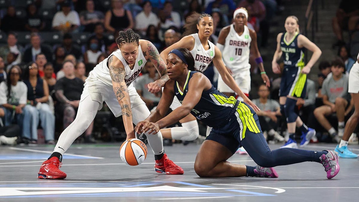 Brittney Griner fights for the ball