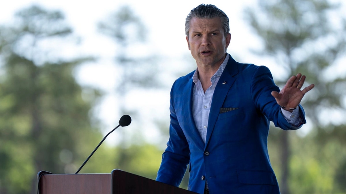 Hegseth at podium