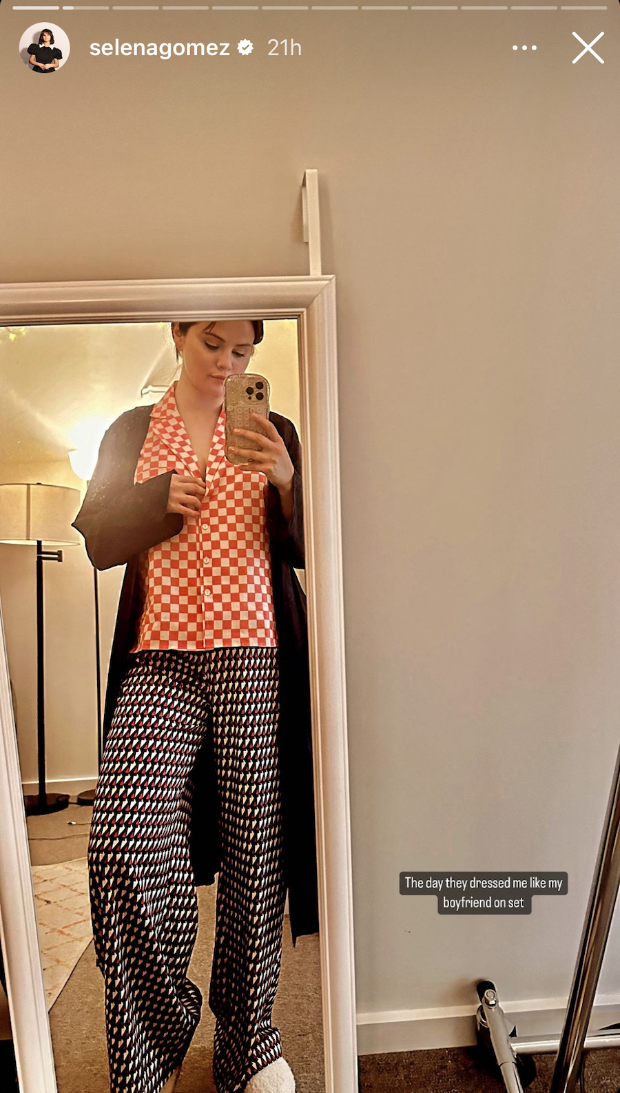 a person taking a selfie in a mirror