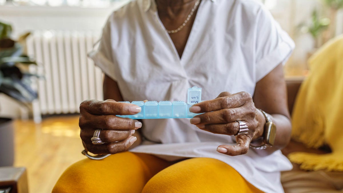 Woman taking medication