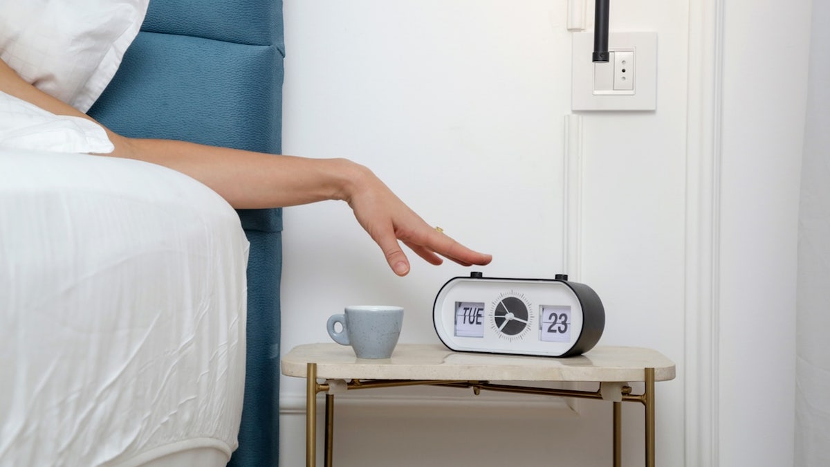 Snooze button alarm clock