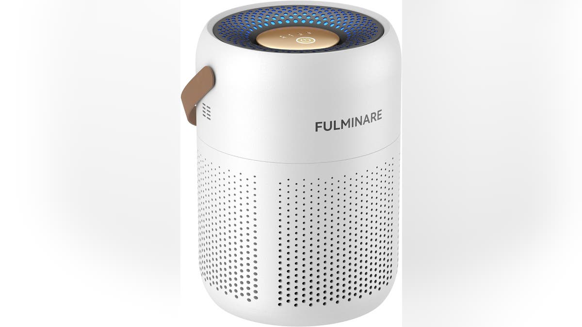 Easily move your air purifier from room to room with the built-in handle. 