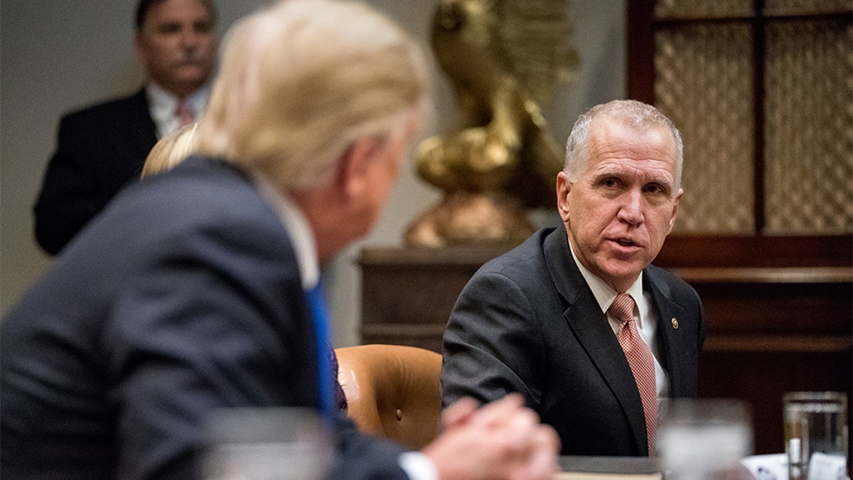 Trump listening as Tillis speaks