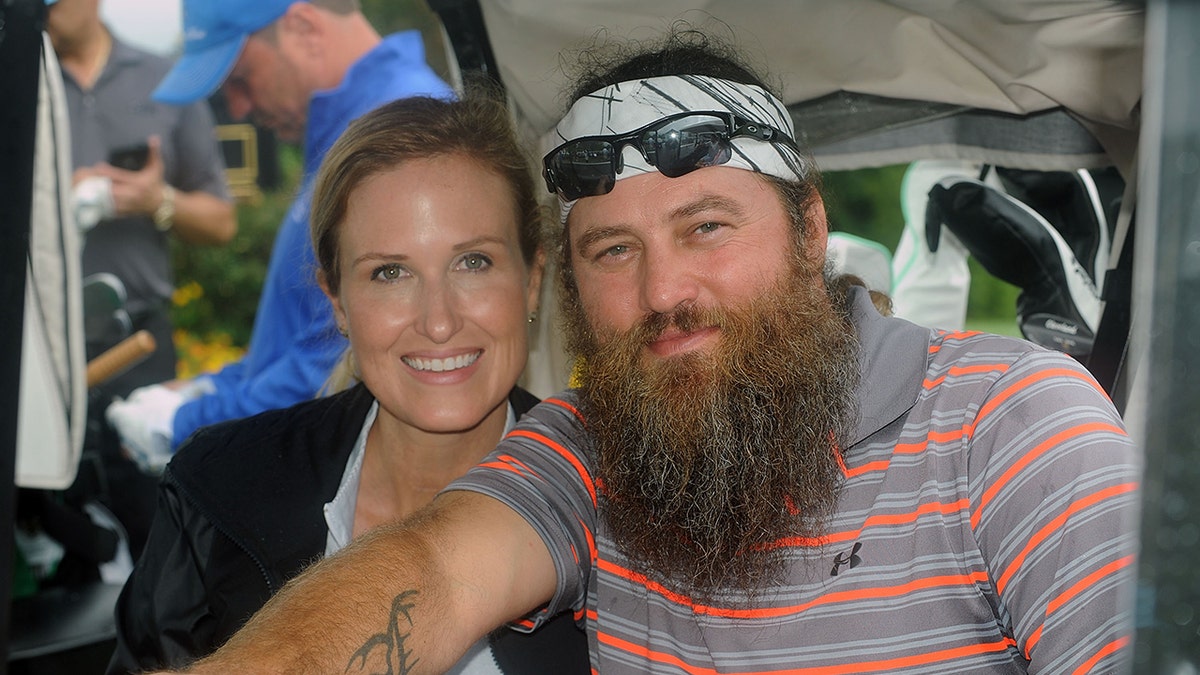 Korie Robertson and Willie Robertson smiling together