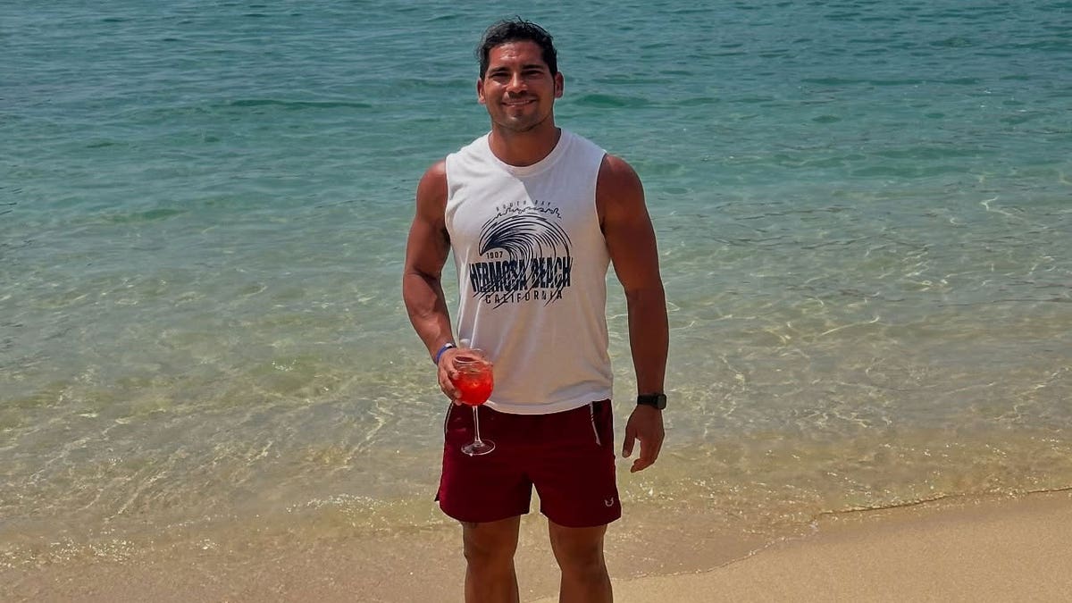 Juan Chaidez on a beach