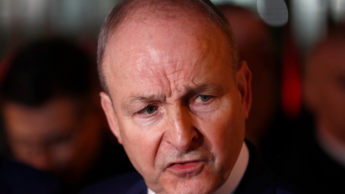 Fianna Fail leader Micheal Martin talks to the media