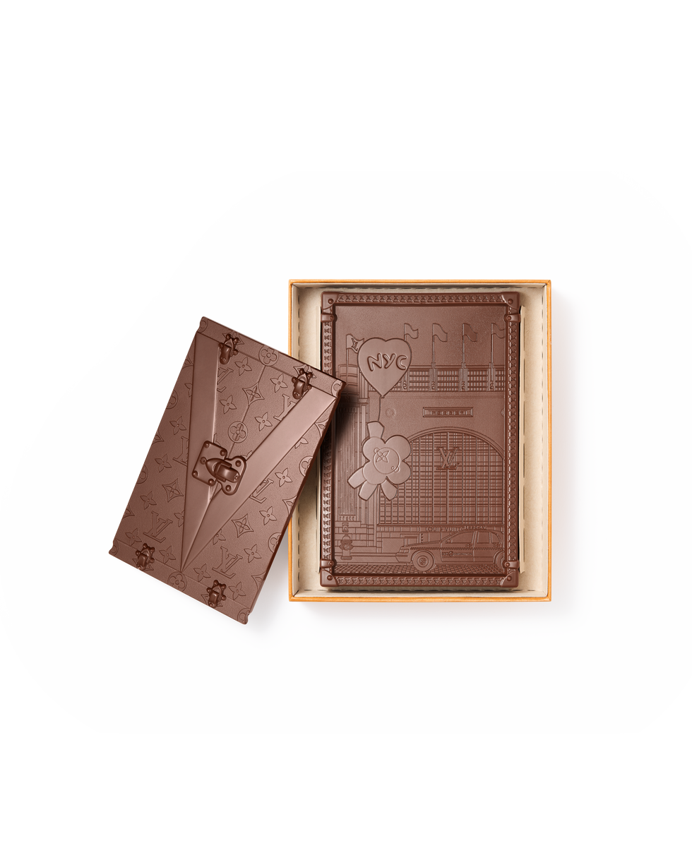a chocolate product designed to resemble a notebook with new york theme elements