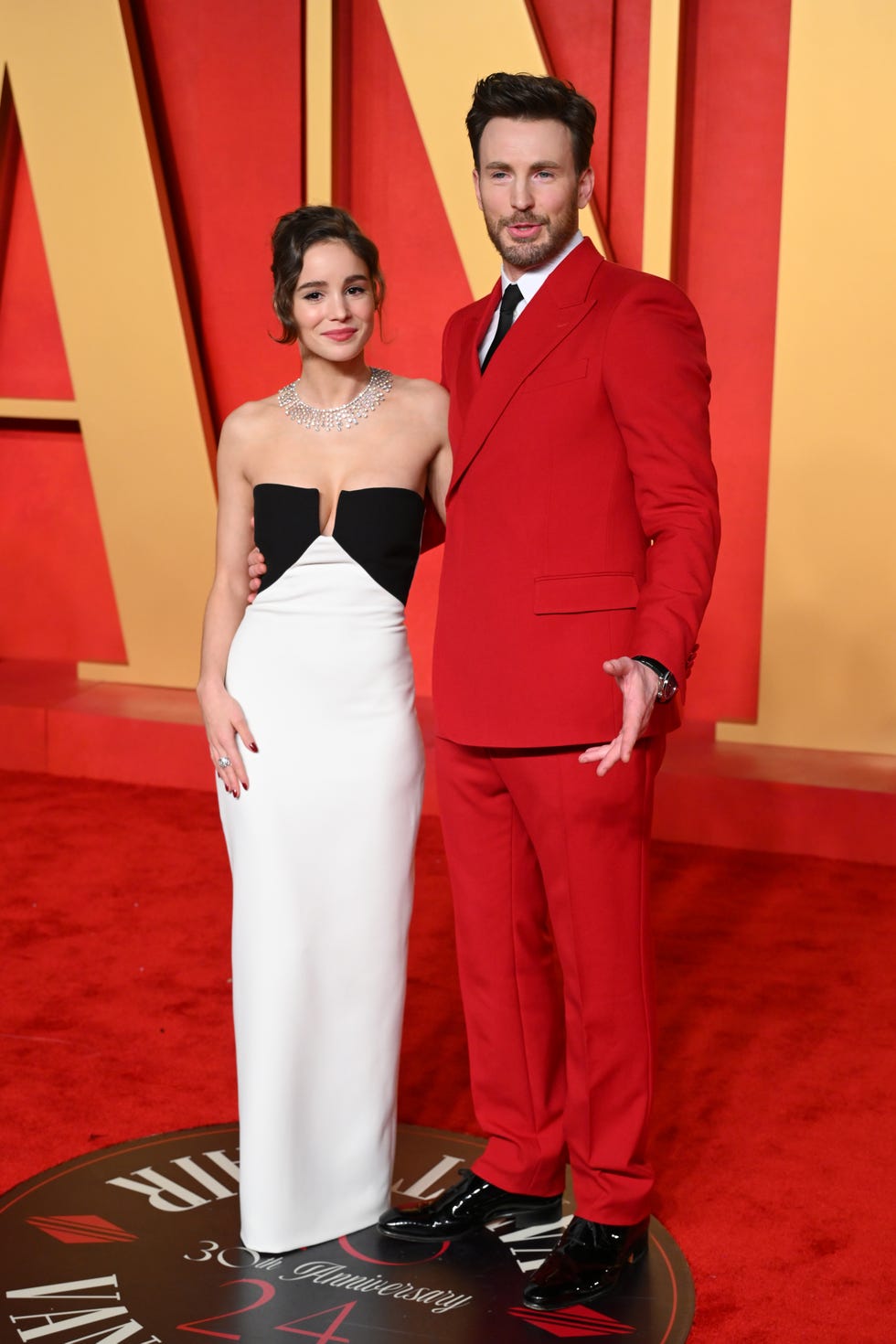 beverly hills, california march 10 alba baptista and chris evans attend the 2024 vanity fair oscar party hosted by radhika jones at wallis annenberg center for the performing arts on march 10, 2024 in beverly hills, california photo by karwai tangwireimage