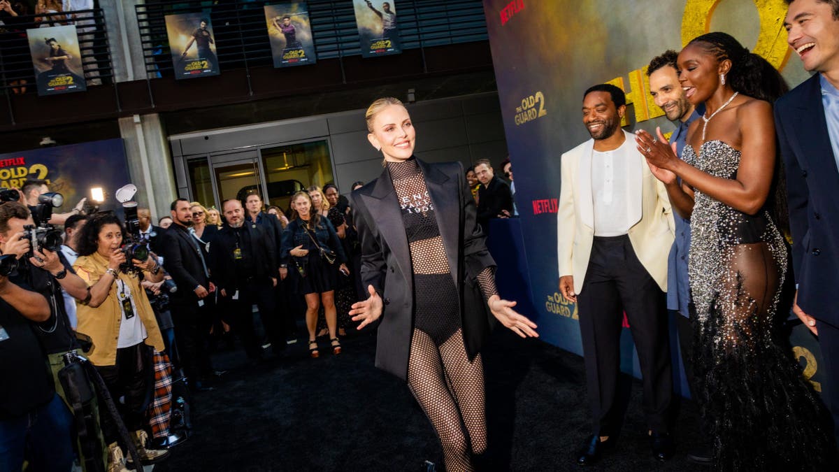 charlize theron walking red carpet