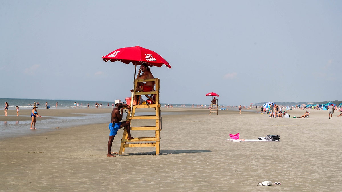 Lifeguards monitor the surf at Coligny Beach on Hilton Head Island.