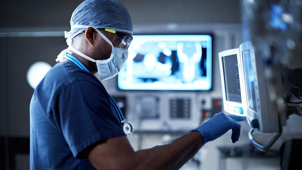 surgeon with monitor