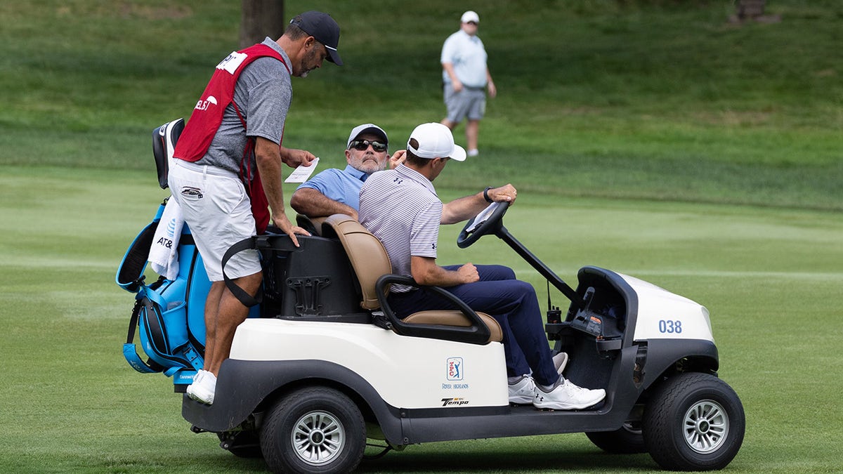 Jordan Spieth drives away after withdrawing