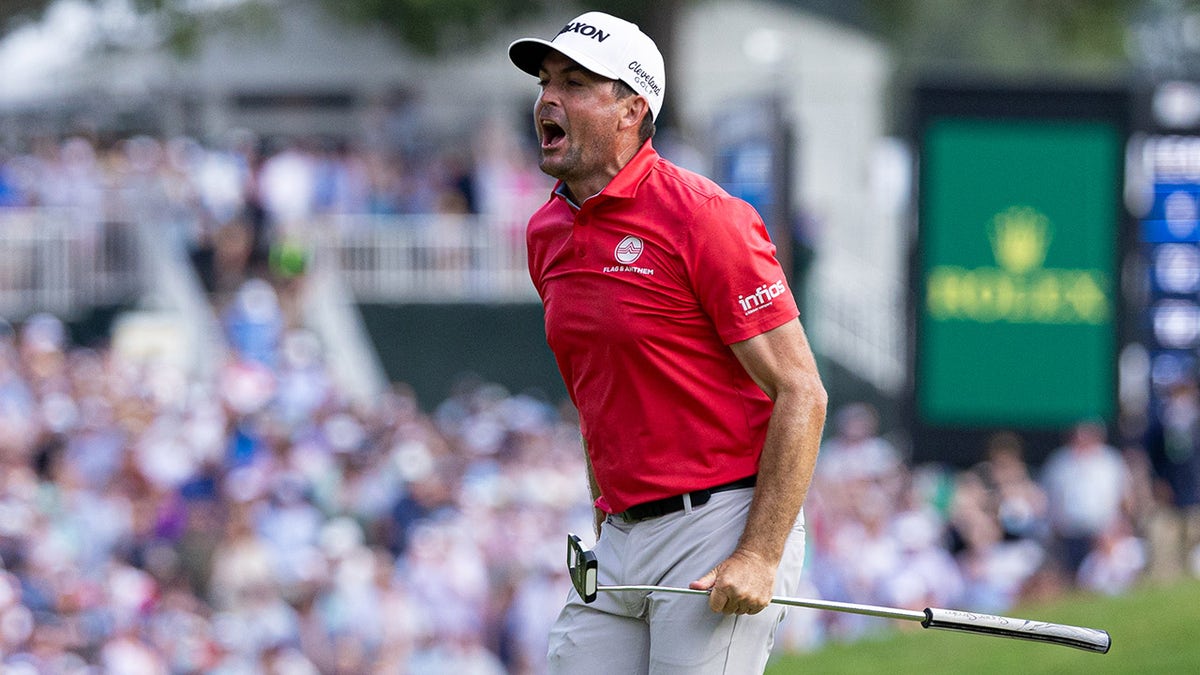 Keegan Bradley reacts after hitting putt