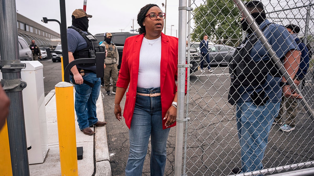 Iver going through gate at detention facility