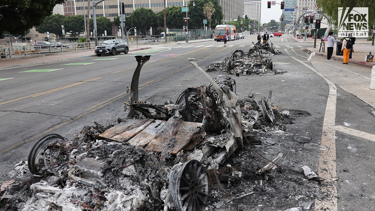 burnt-out car on street in LA