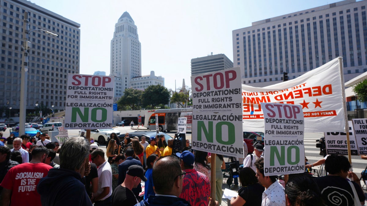 Community organizers protest outside the Federal Building after federal immigration authorities conducted an operation Friday, June 6, 2025, in Los Angeles.