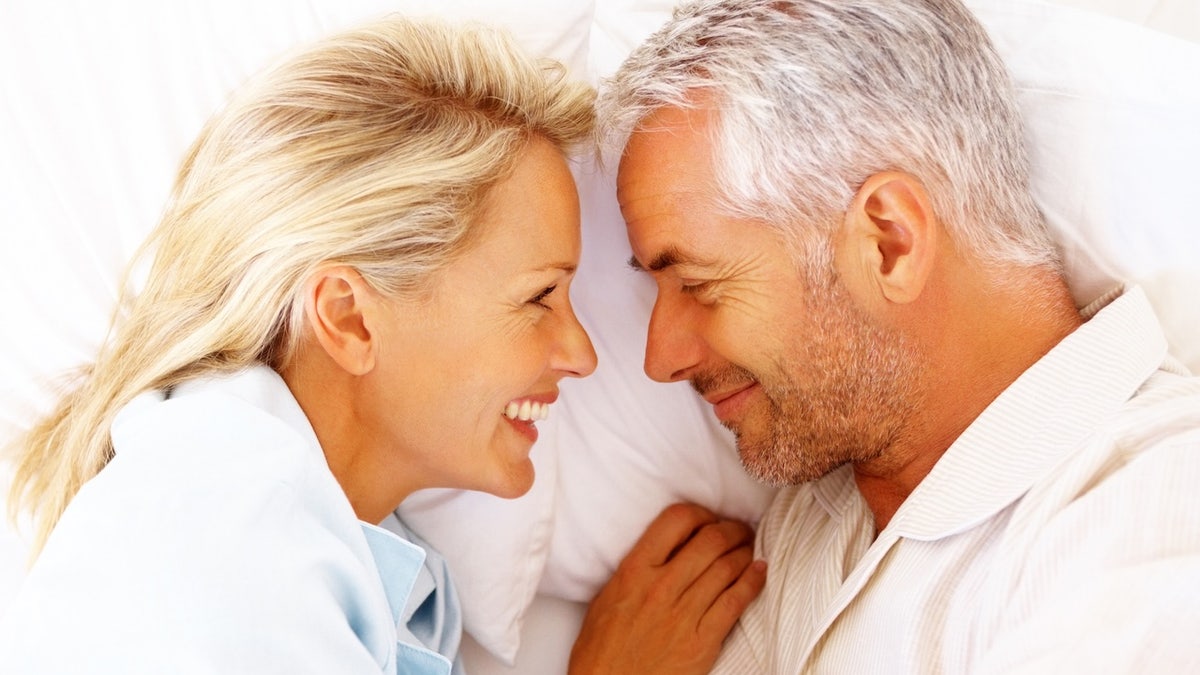 Mature couple cuddling