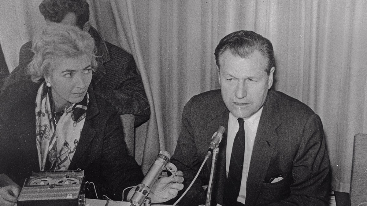 Nelson Rockefeller speaks to reporters