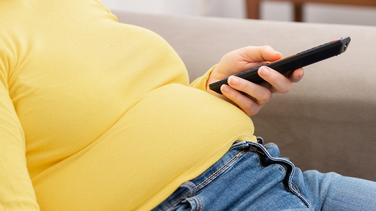 Obese person sitting