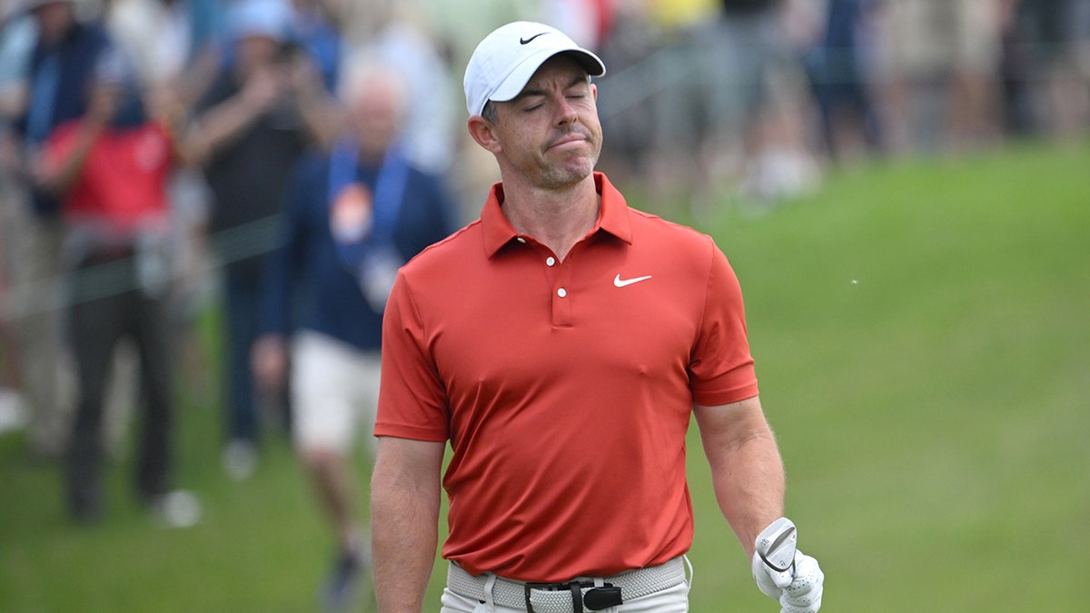 Rory McIlroy walks on course