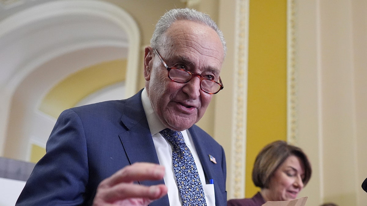 Schumer speaks to reporters inside Capitol 