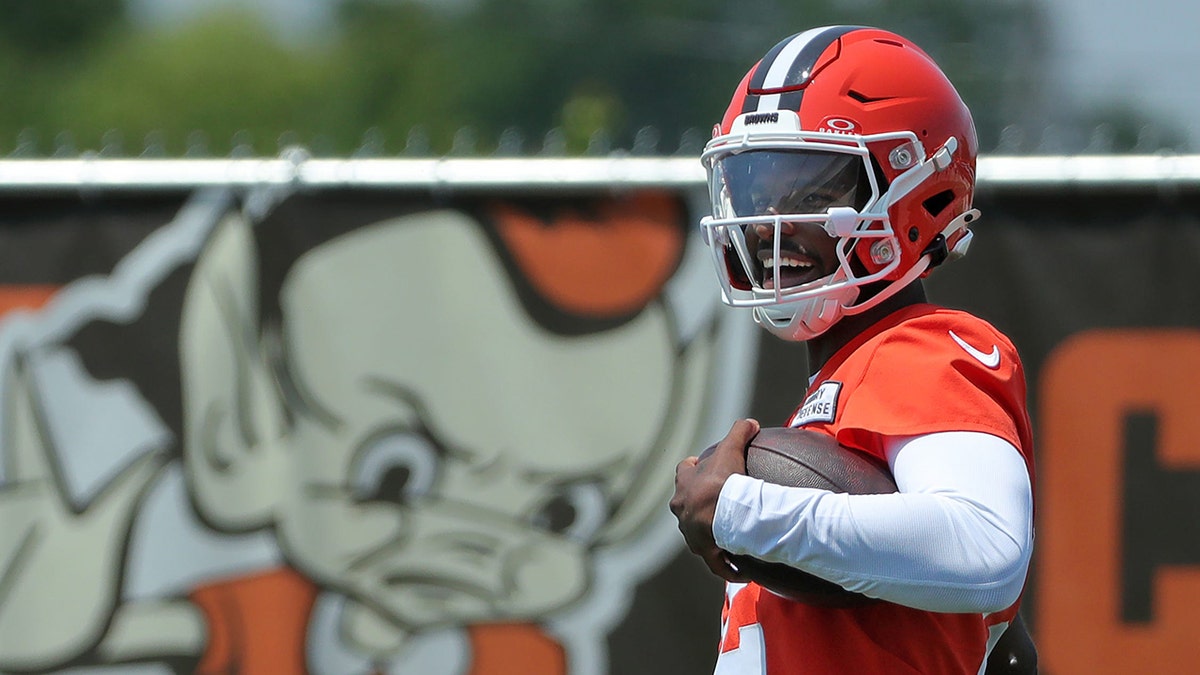 Shedeur Sanders looks on
