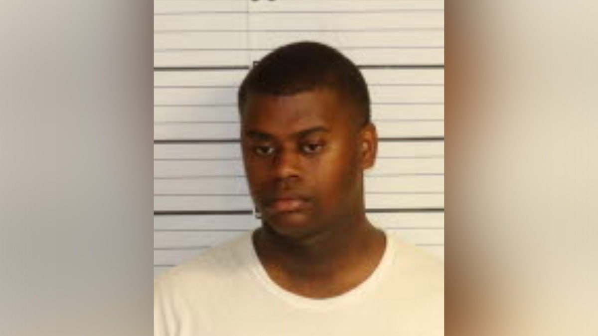 mughot of trenton abston wearing white shirt