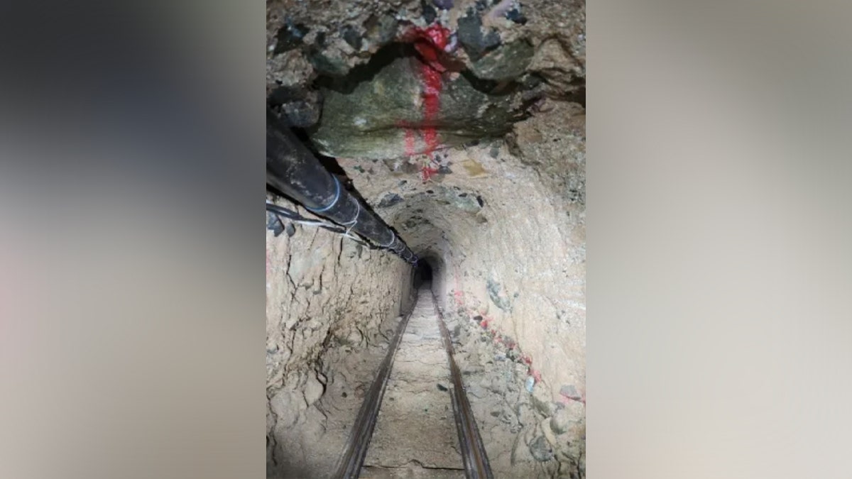The narrow tunnel was nearly 3,000 feet long