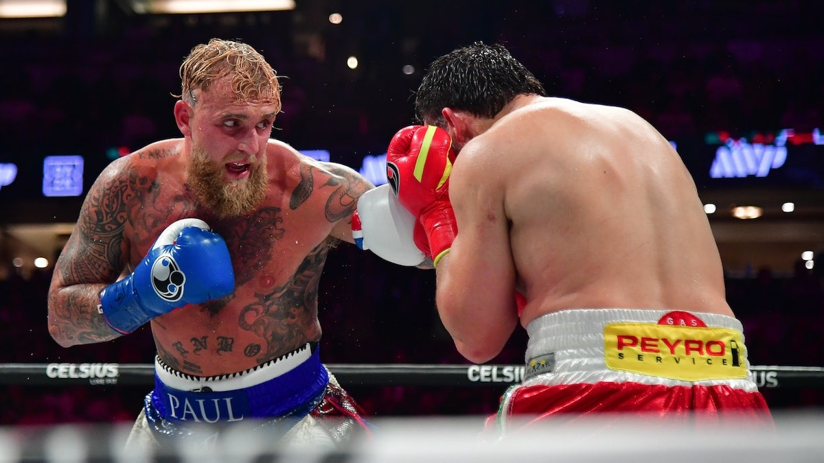 Jake Paul moves in for a hit against Julio Cesar Chavez Jr. at Honda Center. 