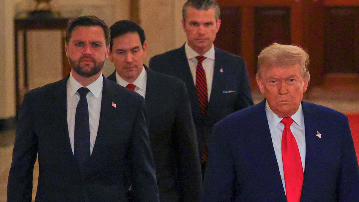 Trump and Vance walk out to White House address