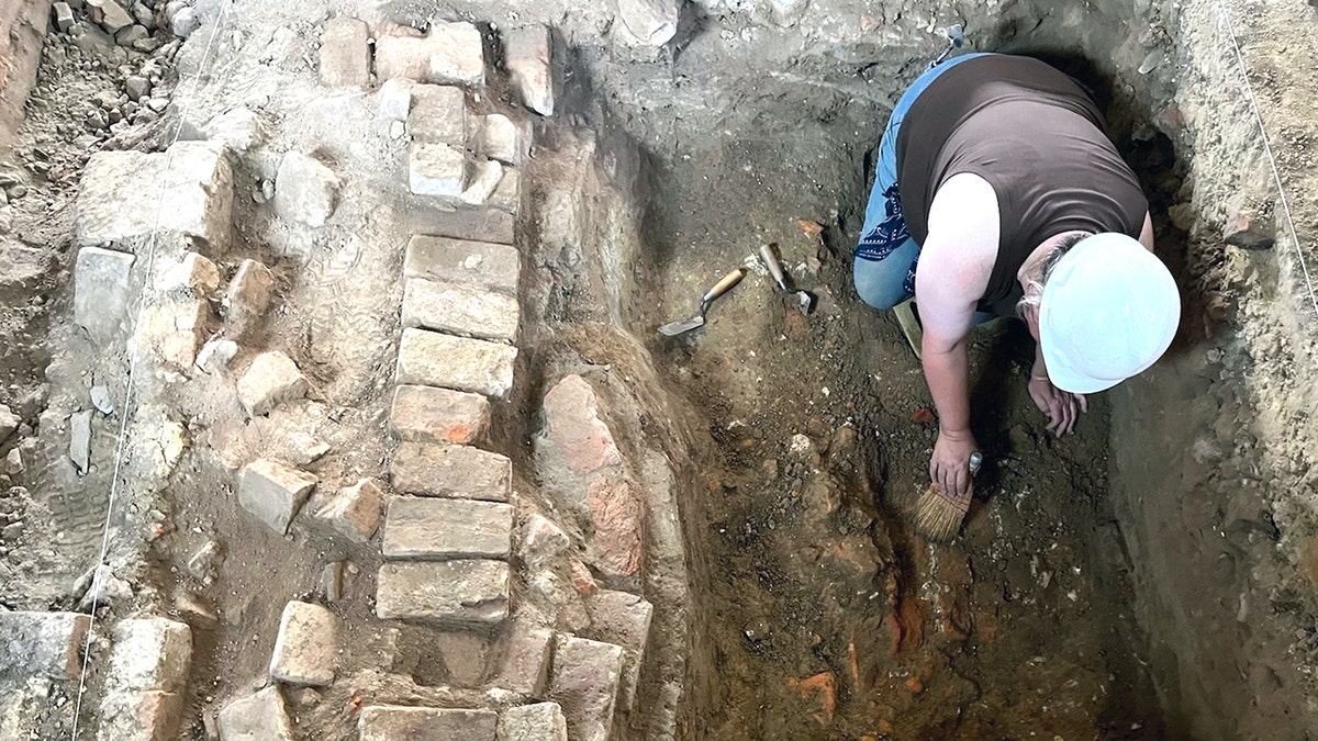 Archaeologist uncovers a foundation from the 1700s that once held the nation's oldest surviving schoolhouse for Black children in 2025, in Williamsburg, Va.