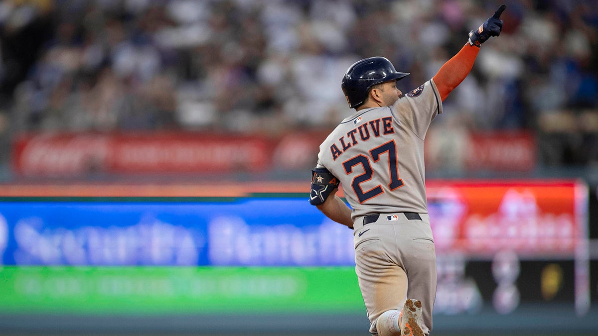 Jose Altuve celebrates
