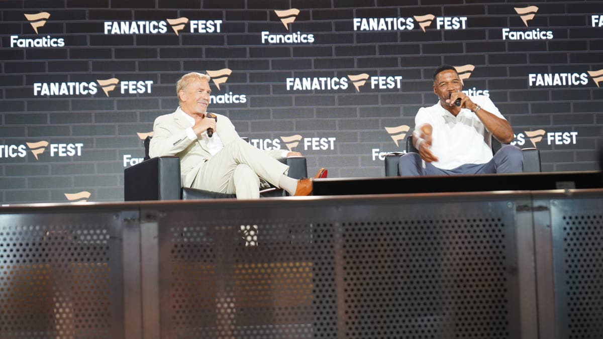 Kevin Costner sits with Michael Strahan
