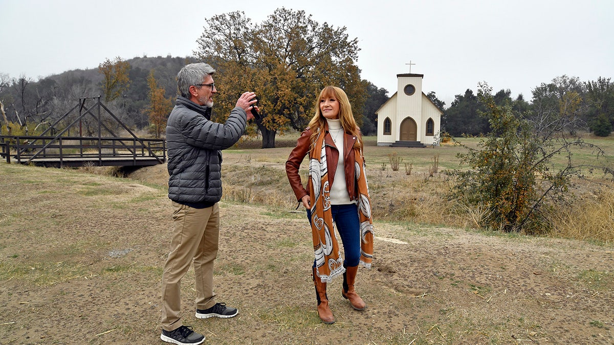 Joe Lando taking a photo of Jane Seymour.
