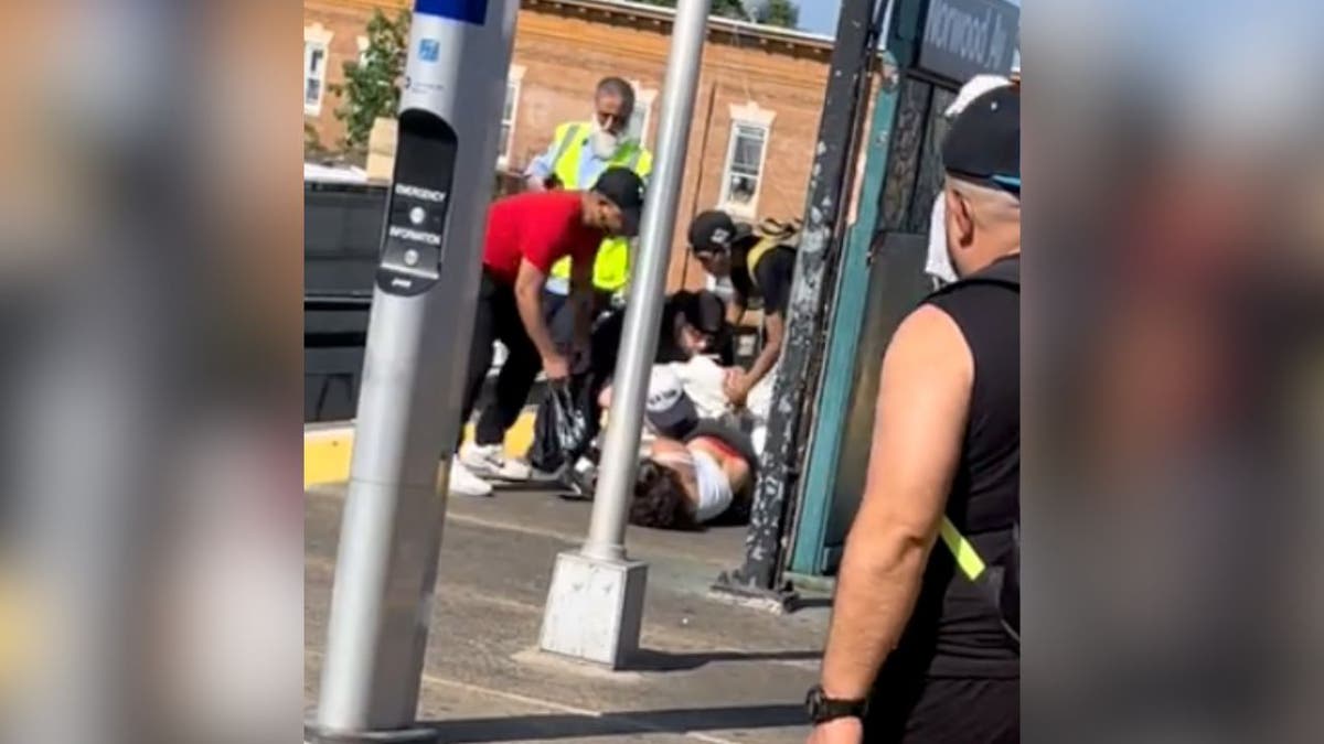 man beaten on ground