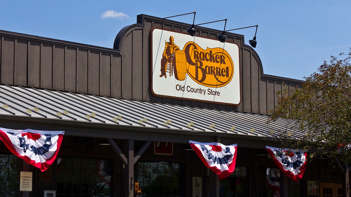 The old logo on the outside of a Cracker Barrel restaurant 