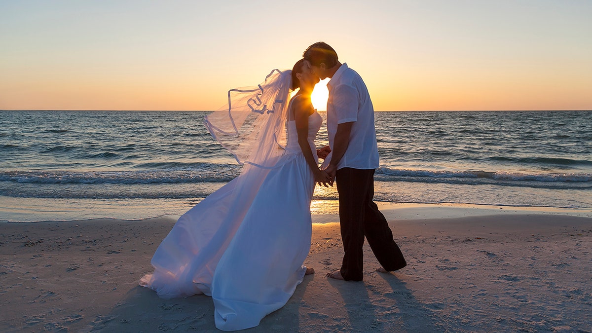 Bride and groom on the beach