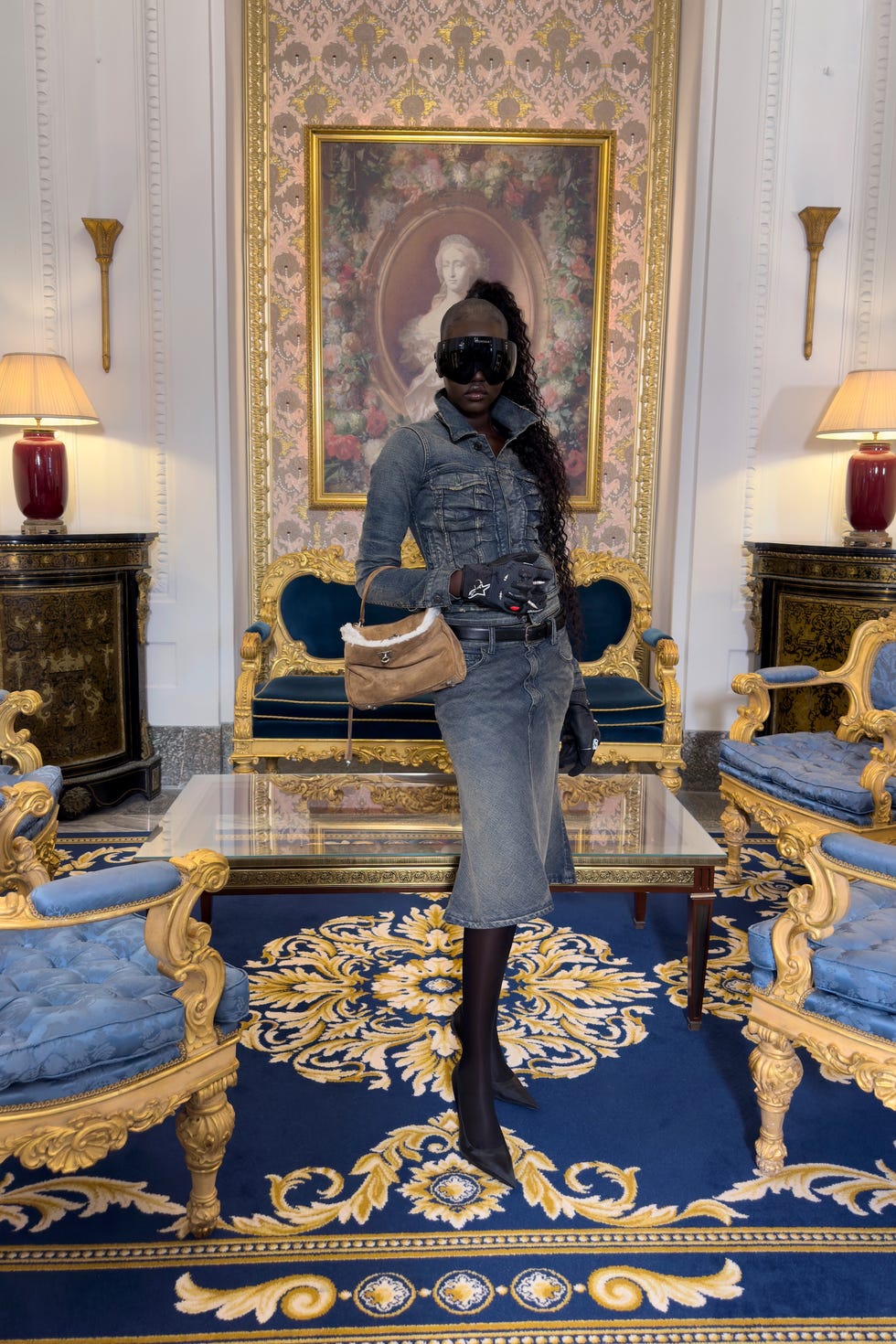 a fashionable individual standing in a luxurious room