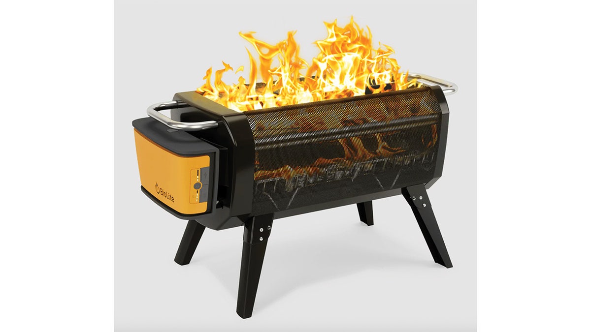 A large, portable fire pit powered by wood or charcoal that you can cook over. 