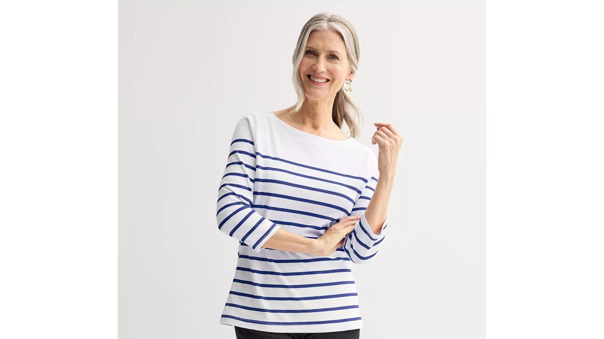 Wear this versatile piece alone or under a jacket.