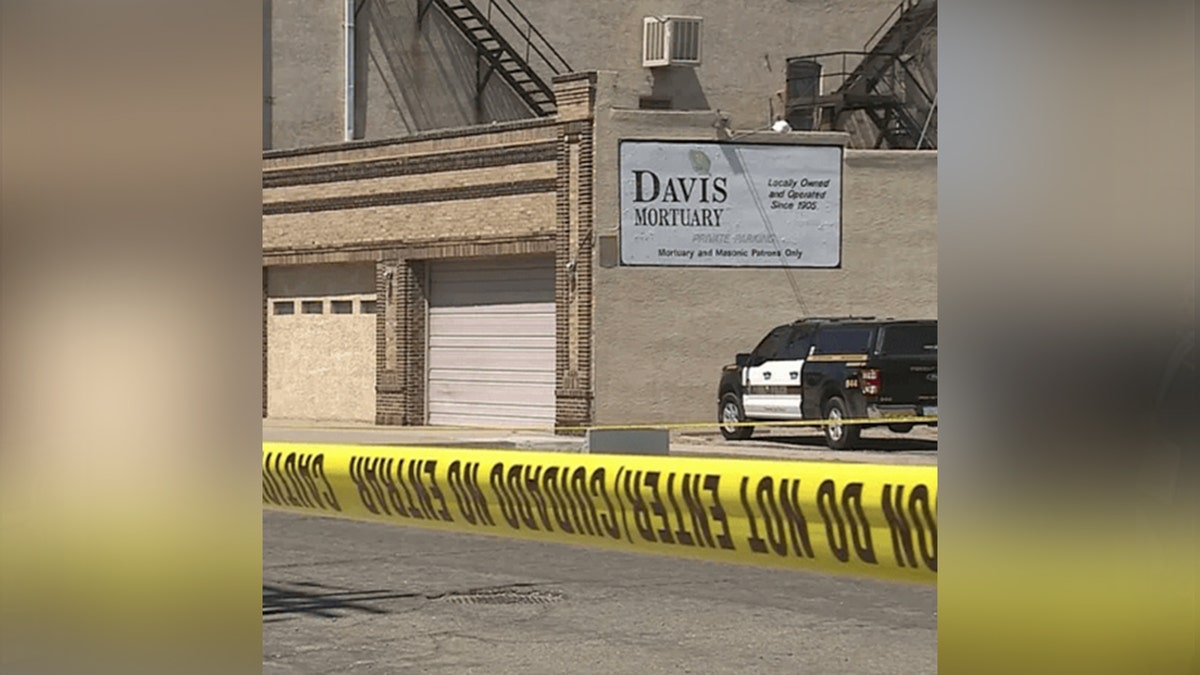 police tape around davis mortuary