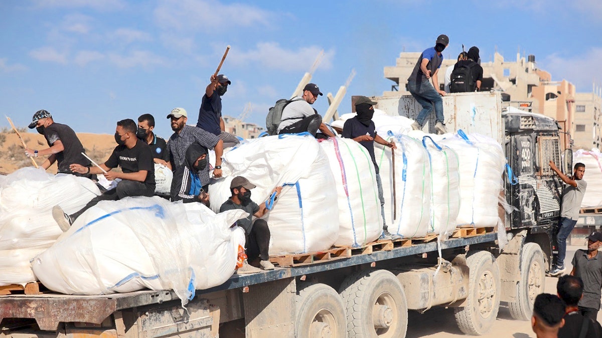 hamas seizes aid trucks