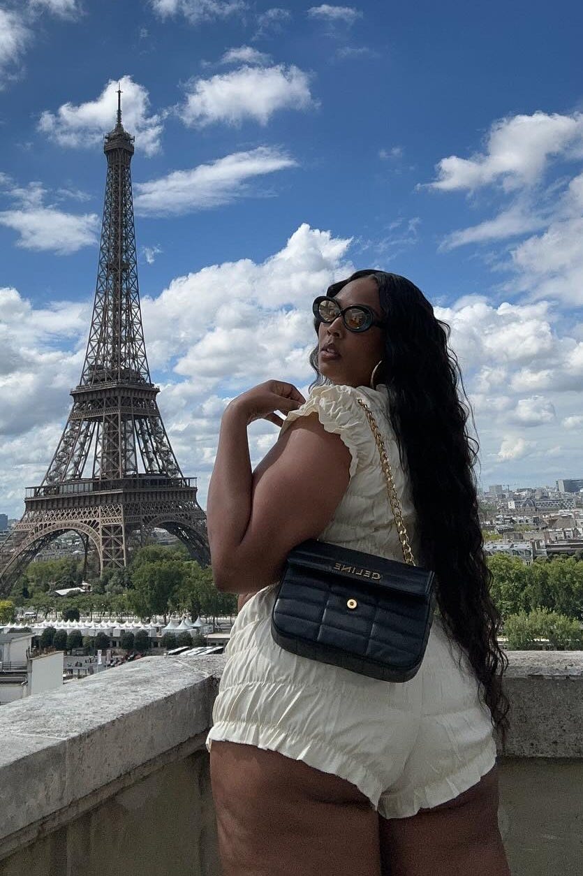 lizzo, honeymoon outfit, celebrity style, white ruffled top and shorts