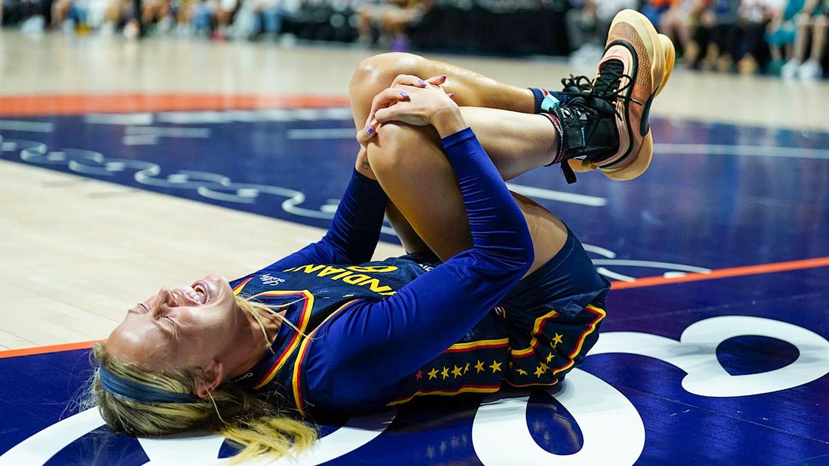 Sophie Cunningham in pain on court