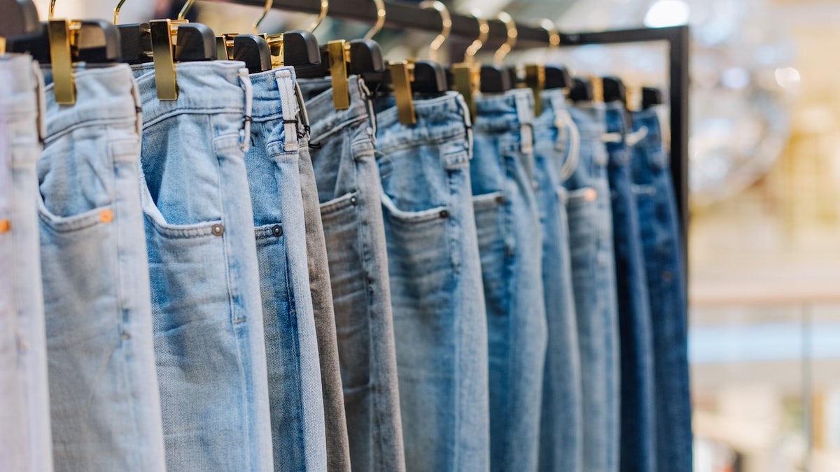 rack of denim jeans