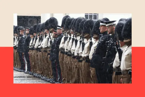 Peter Nicholls/Getty Images Members of the Guard of Honour