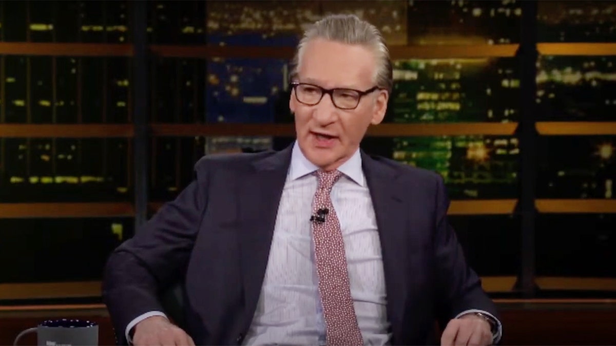 Bill Maher sitting on set of HBO's 'Real Time.'