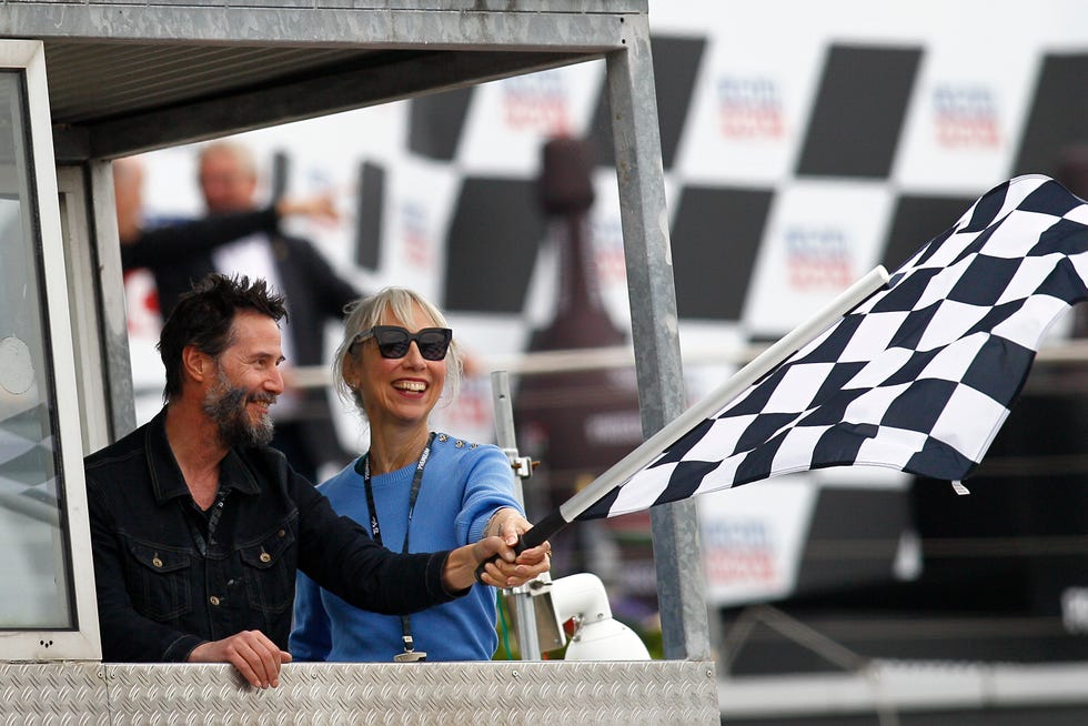 keanu reeves and alexandra grant attend motogp of germany