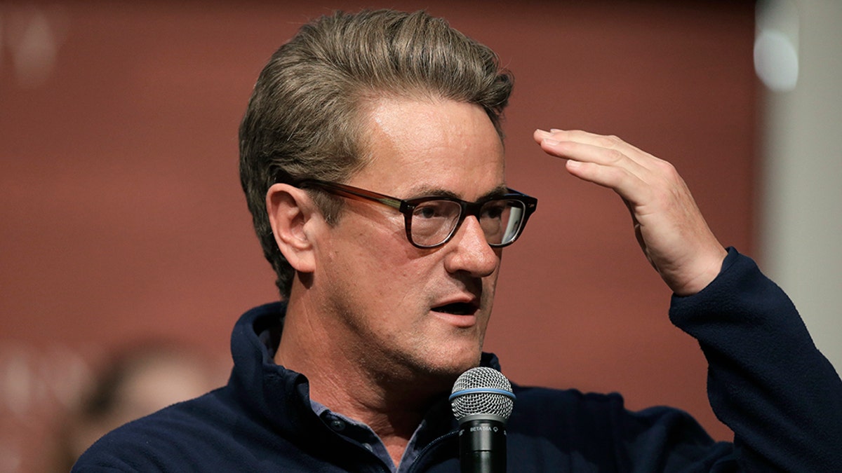 Joe Scarborough takes questions from an audience at forum at the John F. Kennedy School of Government, on the campus of Harvard University, in Cambridge, Mass. Scarborough announced Oct. 12, 2017, that he formally left the Republican party and became an independent. (AP Photo/Steven Senne, File)