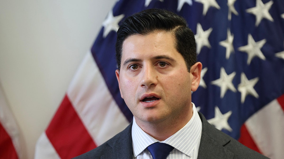 Acting U.S. Attorney Bill Essayli speaks during a Department of Homeland Security news conference at the Wilshire Federal Building in Los Angeles on June 12, 2025.
